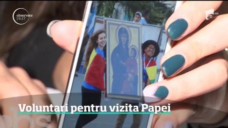 Voluntarii se pregătesc pentru vizita Papei Francisc