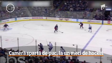 Cameră spartă de puc, la un meci de hockei