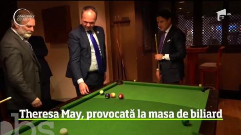 Theresa May va luat parte la o lecţie de biliard în timpul vizitei sale la summitul dintre UE şi Liga Arabă