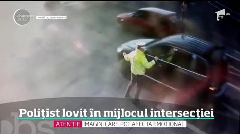 Imagini şocante surprinse de camerele de supraveghere în centrul oraşului Oradea. Un poliţist care dirija circulaţia a fost lovit în plin de o maşină