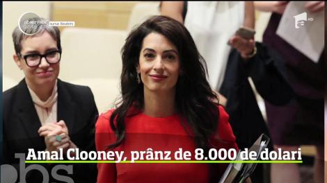 Un student la drept a plătit peste 8 mii de dolari pentru a lua prânzul cu soţia lui George Clooney