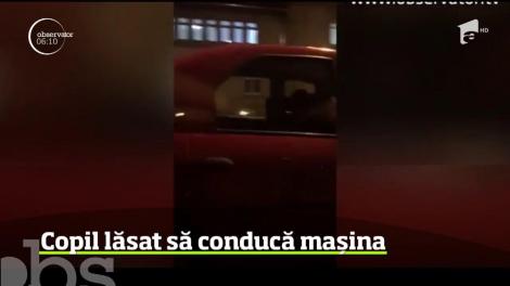 Scene incredibile au fost surprinse pe un bulevard din Braşov! Aici, un băieţel a fost filmat la volanul unei maşini aflată în mers