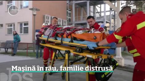 O fetiţă de trei ani a murit, iar sora ei de opt luni este în comă, după ce maşina familiei s-a prăbuşit într-un pârâu, în judeţul Braşov!
