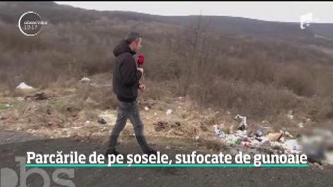 Parcările plătite din bani publici s-au transformat în ghene. Munţi de gunoaie zac pe marginea şoselelor