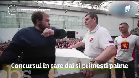 Concursul în care dai și primești palme. Campionatul are loc în Siberia
