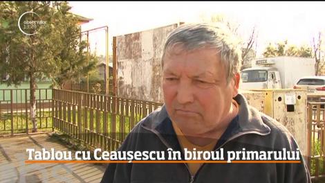 Un primar din Prahova este anchetat de poliţie, după ce şi-a agăţat pe peretele din birou un tablou cu Ceauşescu