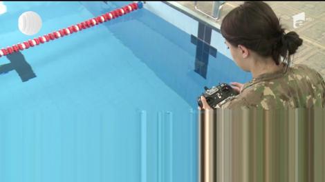 O studentă de la Academia Forţelor Terestre din Sibiu a inventat un submarin, care poate distruge muniţia neexplodată de pe fundul apelor