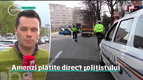 Amenzile de circulaţie vor putea fi plătite, din nou, direct poliţistului