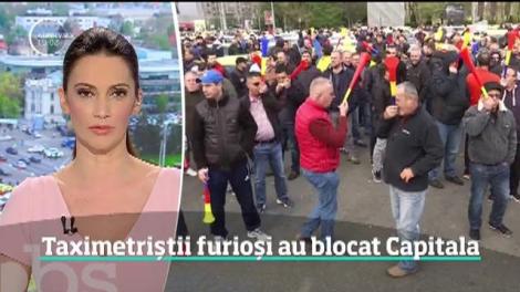 Protest cu ouă şi aparate de taxat călcate în picioare. Capitala a fost blocată de taximetrişti