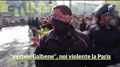 Vestele Galbene, noi violențe la Paris. Protestatarii radicali au incendiat vehicule şi au jefuit şi devastat magazine