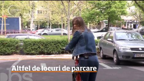 Edilii sectorului 3 din Bucureşti au reuşit să amenajeze o parcare, doar că pe unul dintre locuri sălăşluiesc fără probleme un stâlp şi un copac