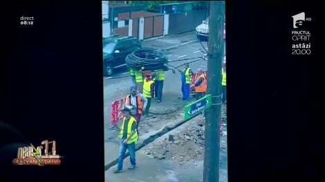 Râzi cu lacrimi! Cum întind câțiva muncitori un cablu pe o stradă din București. Imagini virale - Video