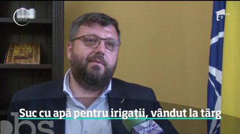 Suc din praf concentrat cu apă de irigat gazonul. Asta au primit contracost participanţii la un târg din Botoşani