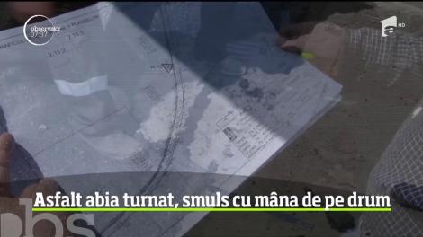 Imagini uluitoare au fost filmate în Vatra Dornei. Astfaltul abia turnat pe o stradă din oraş poate fi ridicat de pe jos cu mâinile goale