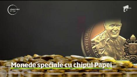 Special pentru colecţionari, Banca naţională a României a lansat o serie de monede, din aur şi din alamă, cu ocazia vizitei Papei Francisc