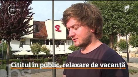 Cititul în public, relaxare de vacanță