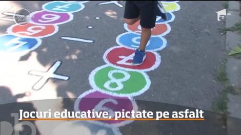 Jocuri educative, pictate pe asfalt