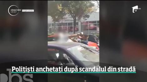 Polițiști anchetați după ce au încercat să imobilizeze un şofer