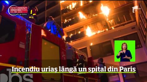 O femeie a murit, iar alte opt persoane au fost rănite într-un incendiu care a devastat un bloc de locuinţe de la periferia Parisului