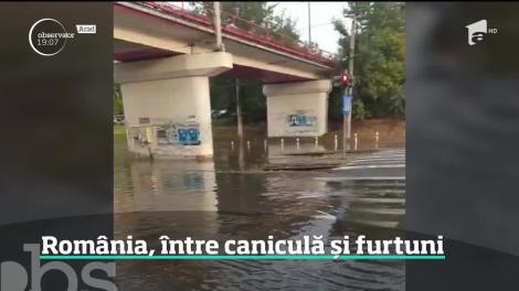 România, între caniculă și furtuni. Pe străzile inundate, şoferii au rămas blocaţi în maşini