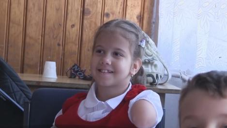 Delia s-a născut fără mâini şi fără picioare, dar vine în fiecare zi la şcoală ca să-şi depăşească limitele
