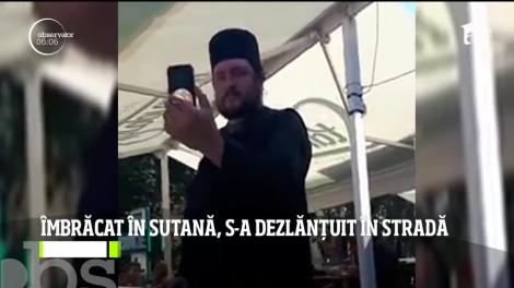 Un presupus călugăr surprins în ce timp adresa cuvinte grele unui taximetrist