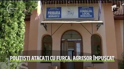 În Gorj, doi poliţişti au fost atacați cu furca, iar agresorul a fost împușcat