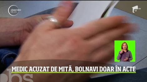 Un medic din Cluj este cercetat pentru luare de mită, după ce ar fi ajutat zeci de persoane să încasez pensii de handicap sau de boală