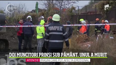 O zi de muncă pe şantier s-a transformat într-o tragedie. Doi muncitori au fost prinşi sub un morman de pământ, unul dintre ei a murit în timpul misiunii de slavare