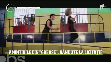Costumul provocator purtat de Olivia Newton-John în filmul clasic din 1978, "Grease", a fost vândut la licitaţie, în California, cu peste 400.000 de dolari