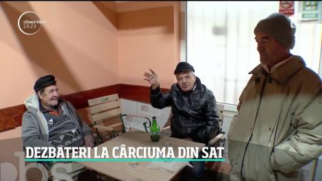 Dezbateri la cârciuma din sat
