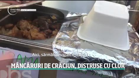 Carne ţinută pe jos, în ligheane, iar apoi gătită pe trotuar la un Târg de Crăciun din România