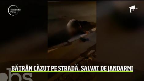 Bătrân căzut pe stradă, salvat de jandarmii din Brașov