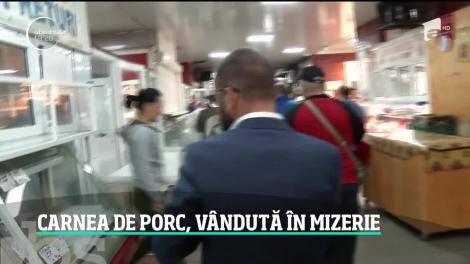 Piaţa Obor: Carne de porc, vândută în mizerie