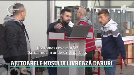 Ajutoarele Moșului livrează daruri