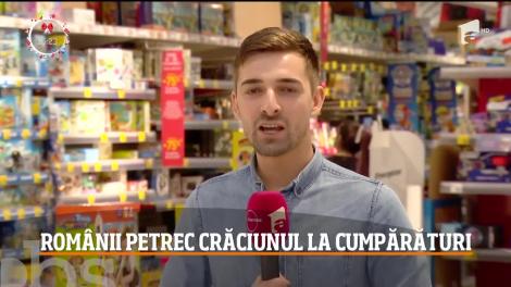 Românii petrec Crăciunul la cumpărături