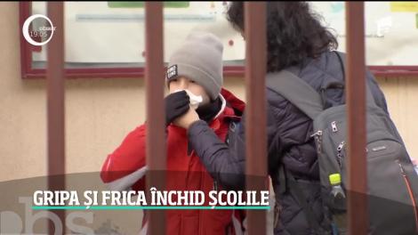 Gripa și frica închid școlile din România