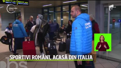 Sportivii români s-au întors acasă din Italia. Conducerea îi ameninţă cu demiteri, dacă cumva se gândesc să nu mai vină la serviciu