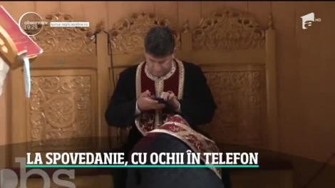 Un preot controversat este din nou în centrul unui scandal. A fost surprins cu ochii în telefon, în timpul spovedaniei