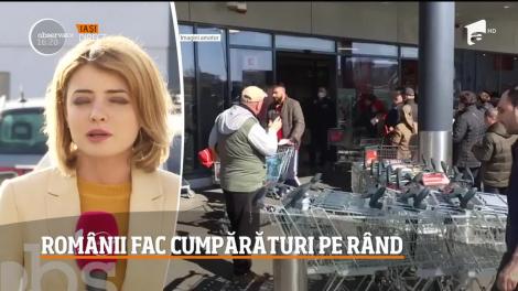 Românii fac cumpărături pe rând de teama cronavirus