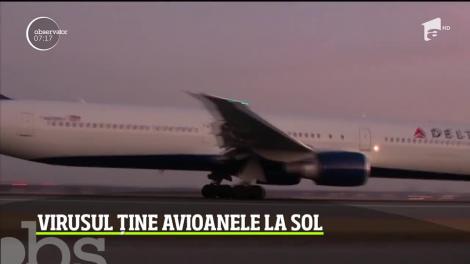 Companiile aeriene aterizează forţat din cauza coronavirusului