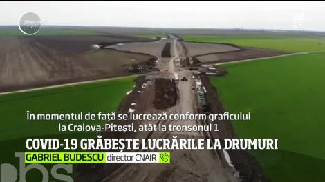 Într-o lume închisă, un drum expres Craiova-Pitești e deschis. Pentru muncitori şi utilaje. Şi se lucrează la foc continuu pentru a fi gata la timp