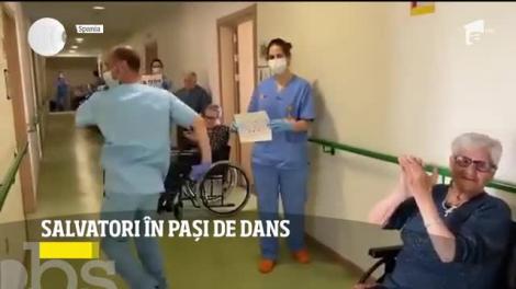 Medici şi asistenţi din toată lumea îşi trimit încurajări în paşi de dans