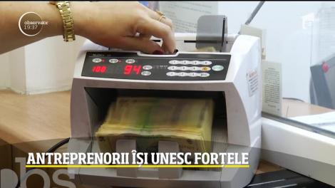 Antreprenorii îşi unesc forţele ca să îşi salveze unii altora afacerile