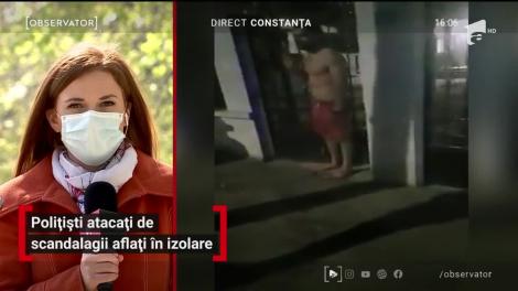 Polițiști atacați de scandalagii aflați în izolare
