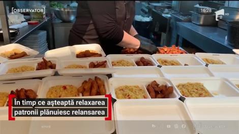 În timp ce așteaptă relaxarea, patronii de restaurante plănuiesc relansarea