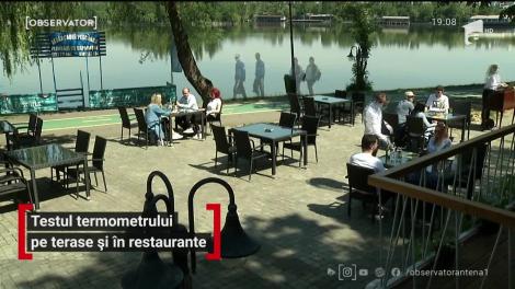 Testul termometrului pe terase și în restaurante