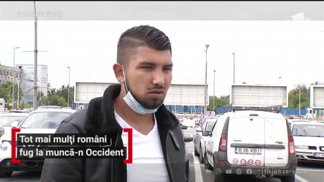 Tot mai mulți români fug la muncă-n Occident