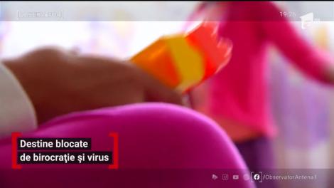 Adopțiile copiilor, blocate de birocrație și virus