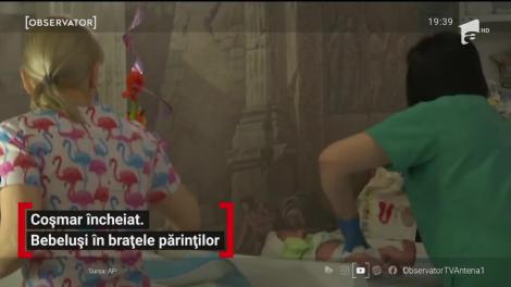 Zeci de părinţi şi-au strâns în braţe pentru prima dată bebeluşii, născuţi din mame-surogat în Ucraina